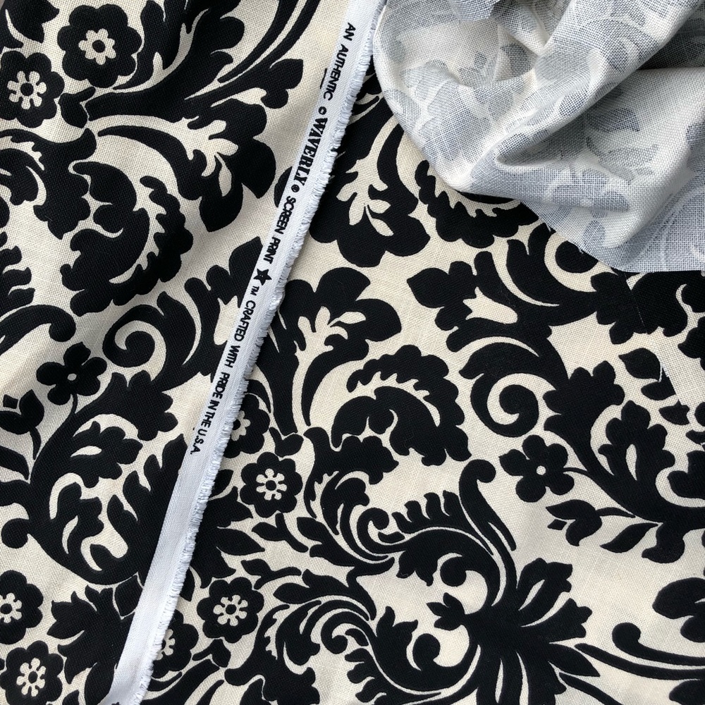 Yards of black screen print Waverly fabric
